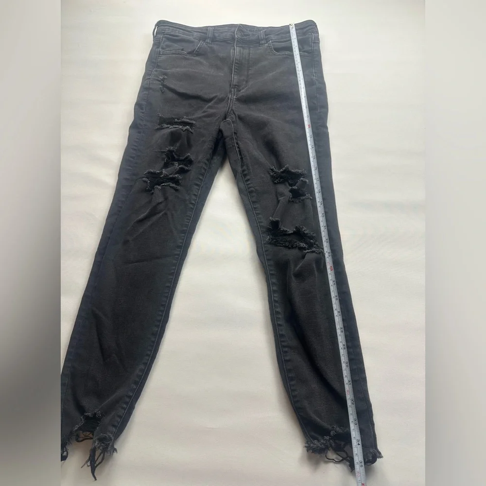 AE Distressed Black Skinny Jeans. Super high waist. Fits size 10-12